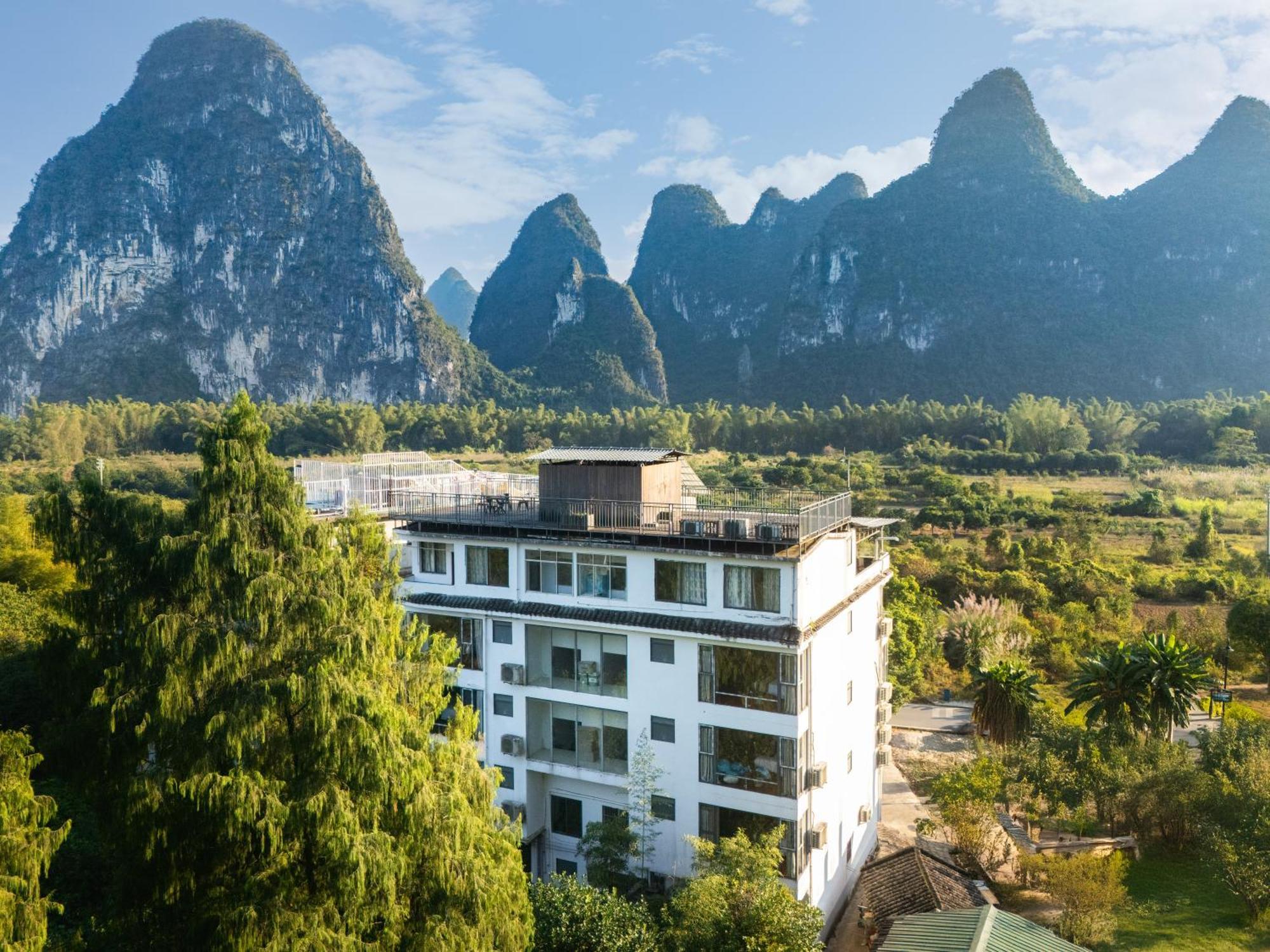 Leisure Courtyard Hotel Yangshuo-Free Shuttle Bus To Yangshuo Station Stay 2 Nights One Way Екстер'єр фото